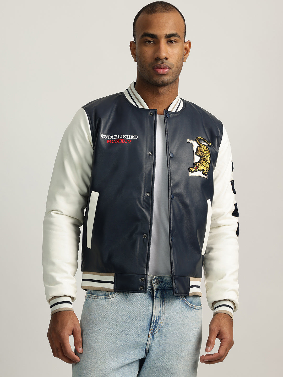 Shop Iconic Men Blue Color-Blocked Stand Collar Full Sleeves Varsity Jacket  Online