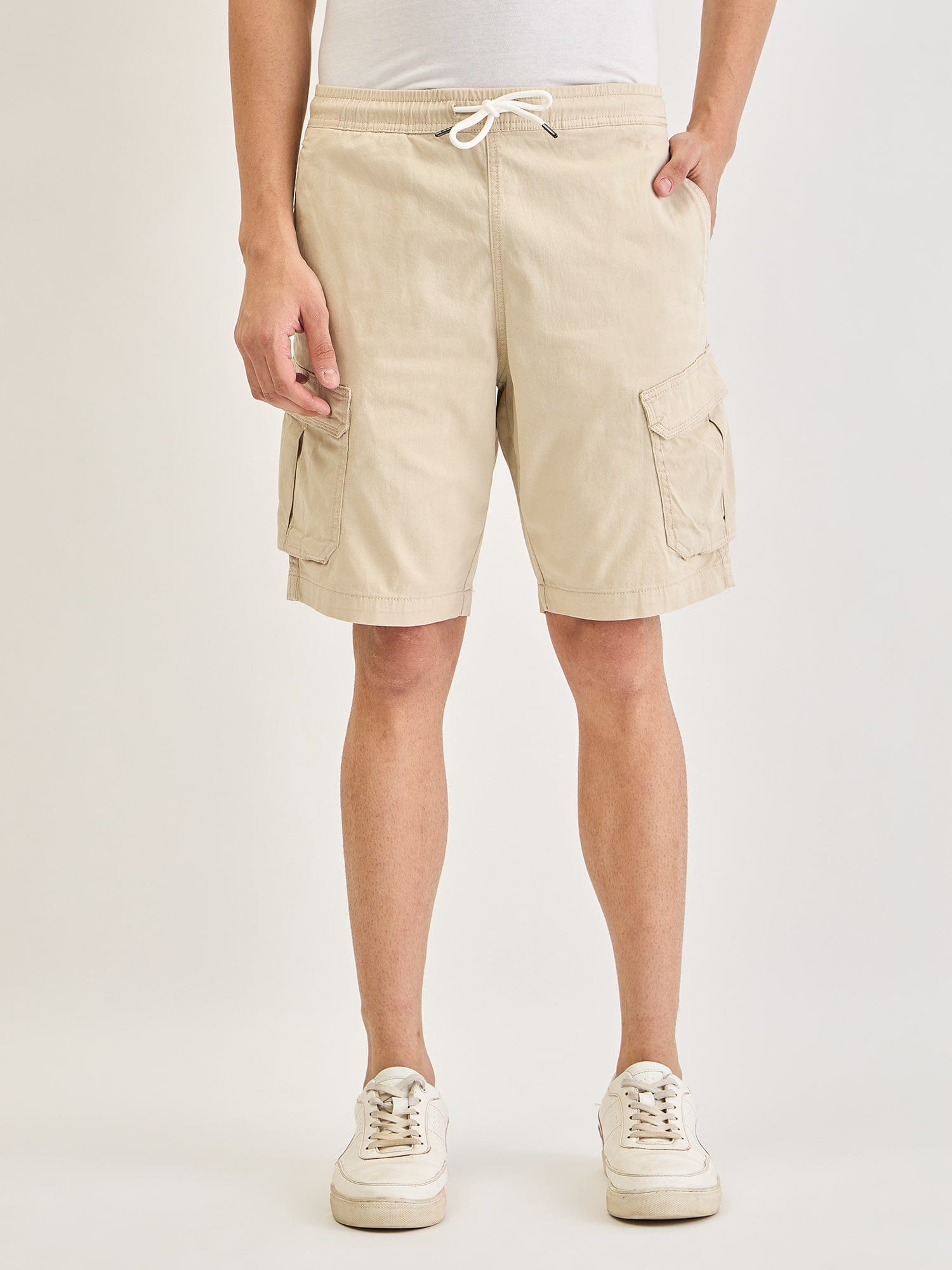 Shop Lindbergh Men Cream Relaxed Fit Solid Shorts Online – Iconic