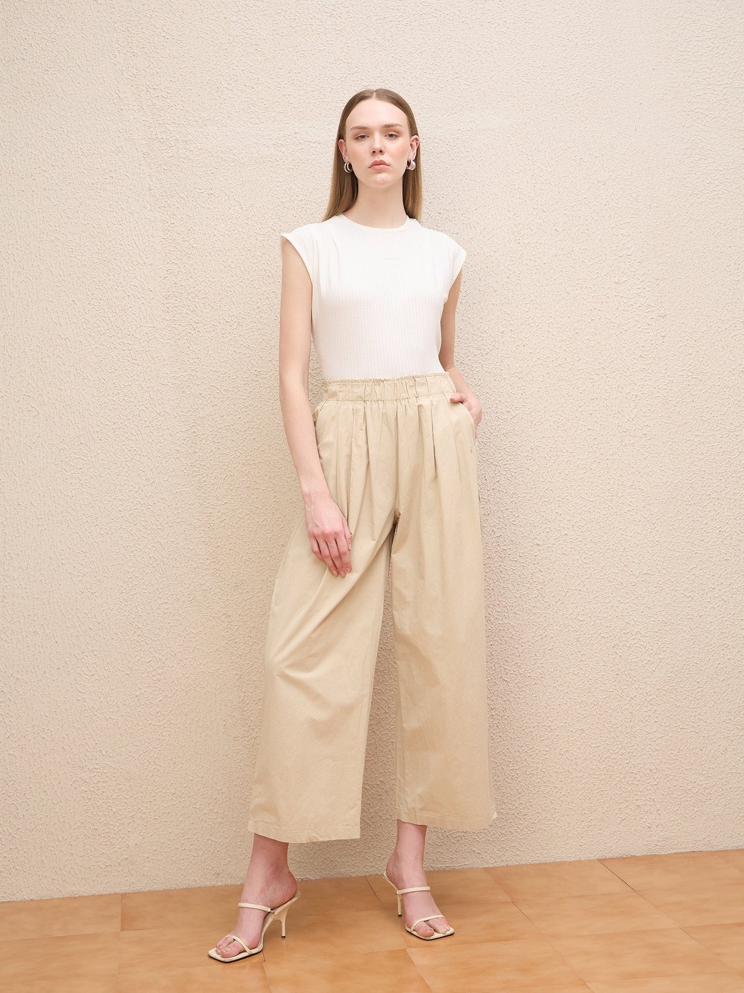 Iconic Women Beige Baggy Fit Solid Trouser