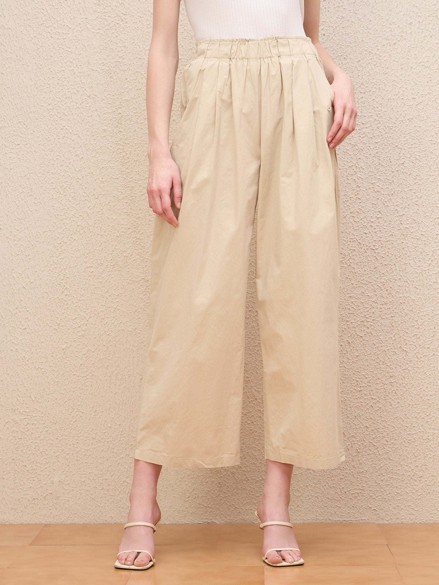 Iconic Women Beige Baggy Fit Solid Trouser