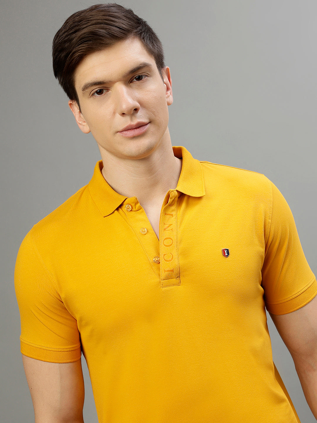 Iconic Men Mustard Solid Polo Collar Short Sleeves Tshirt