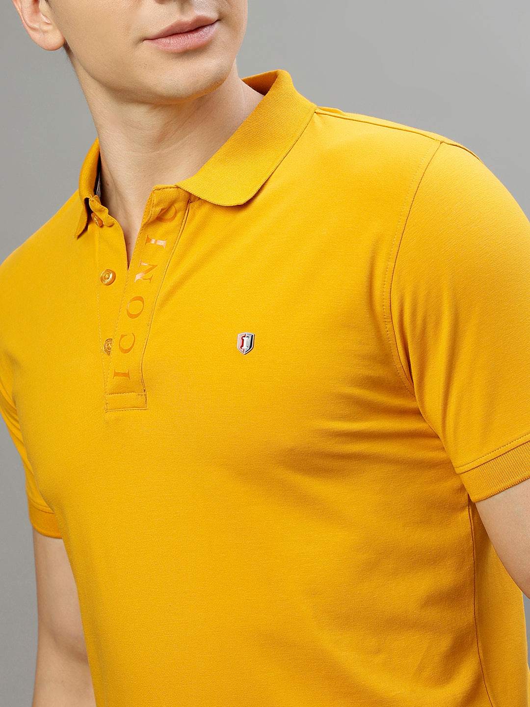 Iconic Men Mustard Solid Polo Collar Short Sleeves Tshirt