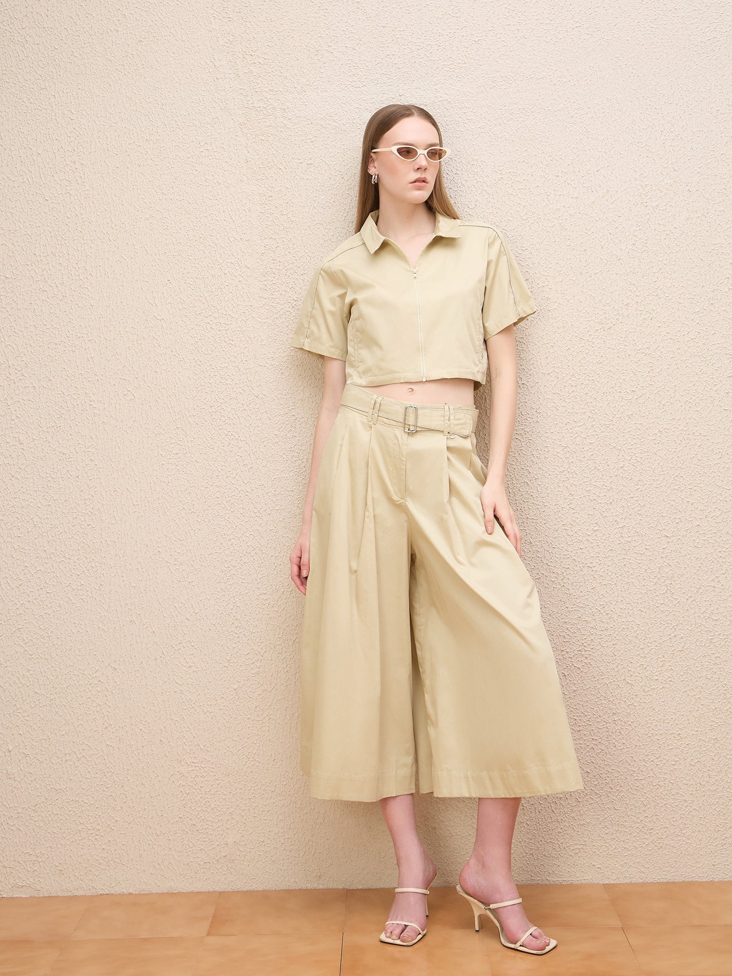 Iconic Women Cream Flared Fit Solid Trouser