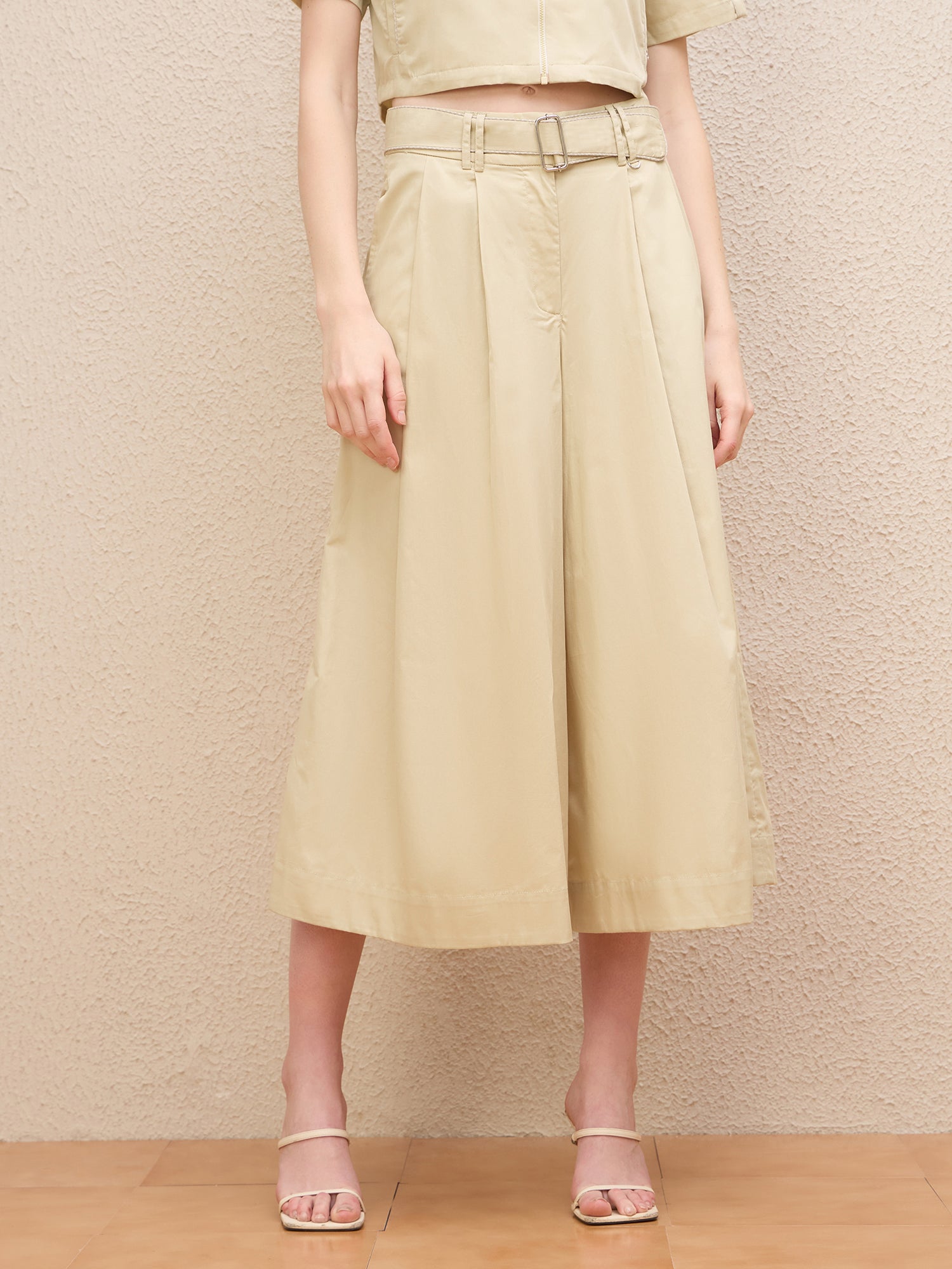 Iconic Women Cream Flared Fit Solid Trouser