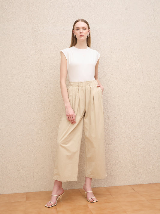Iconic Women Beige Baggy Fit Solid Trouser