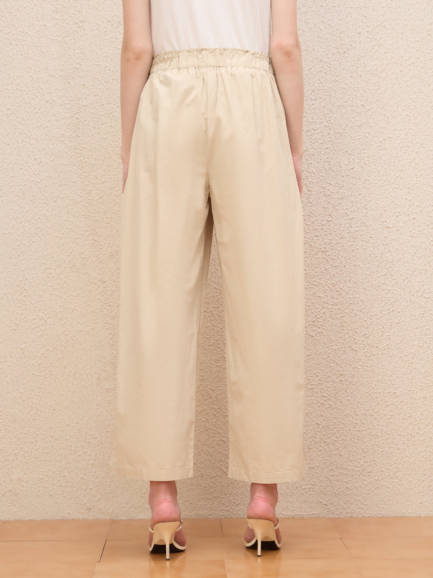 Iconic Women Beige Baggy Fit Solid Trouser
