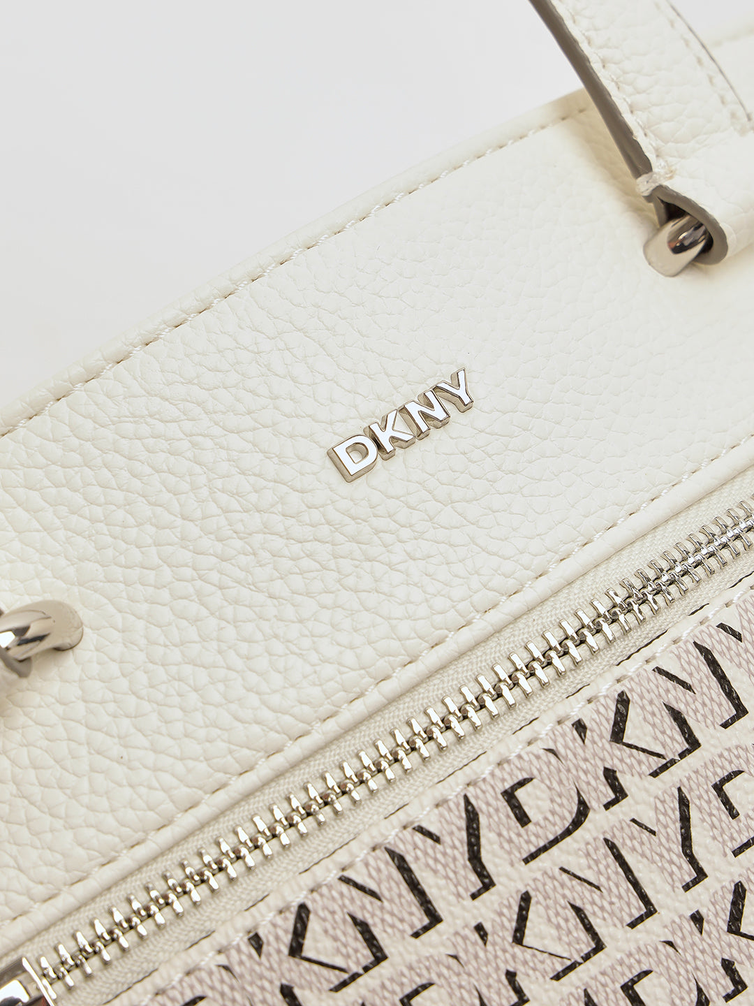 DKNY Women Cream Printed Mini Tote Tote Bags