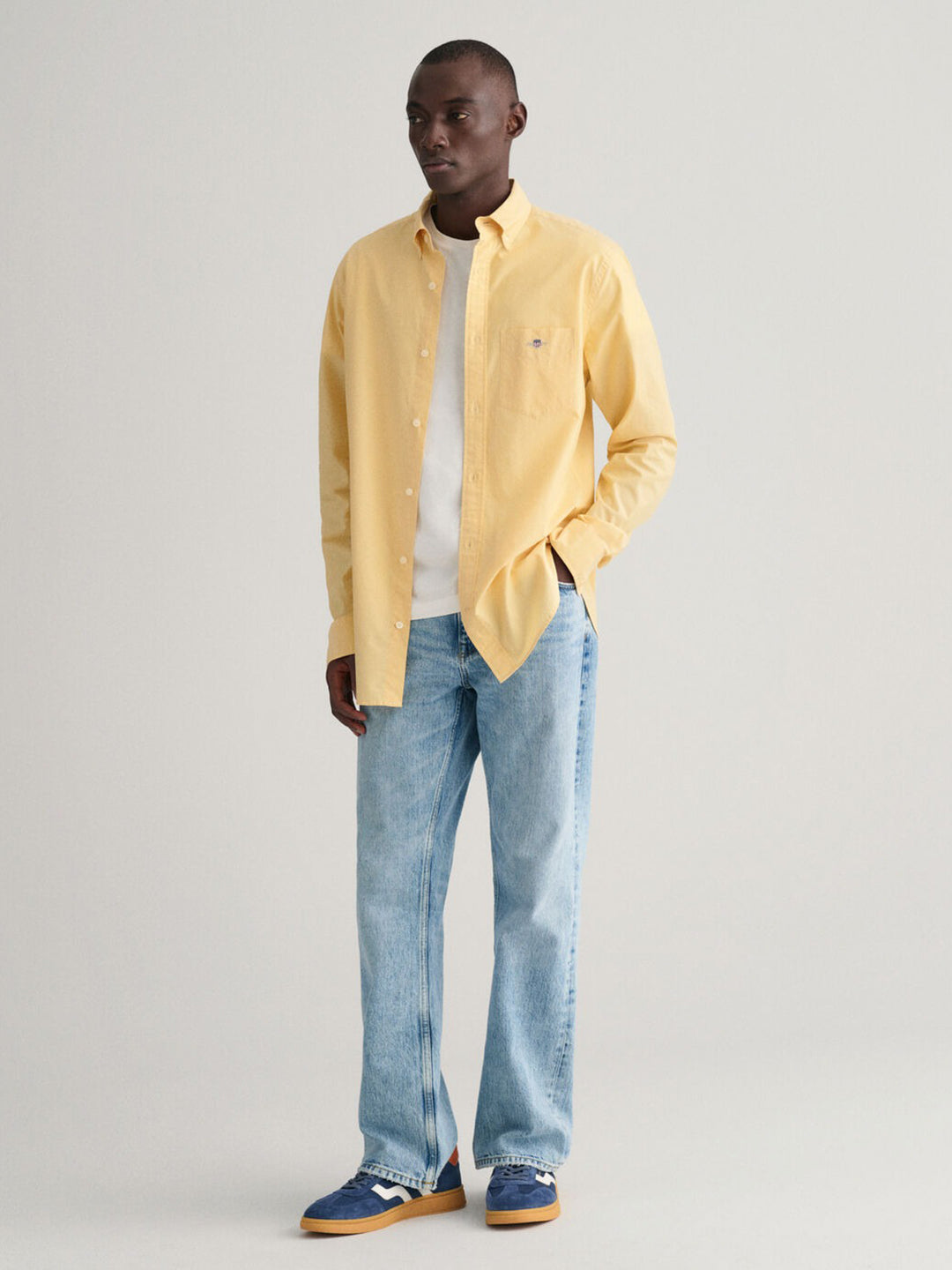 blue and yellow long sleeve shirt
